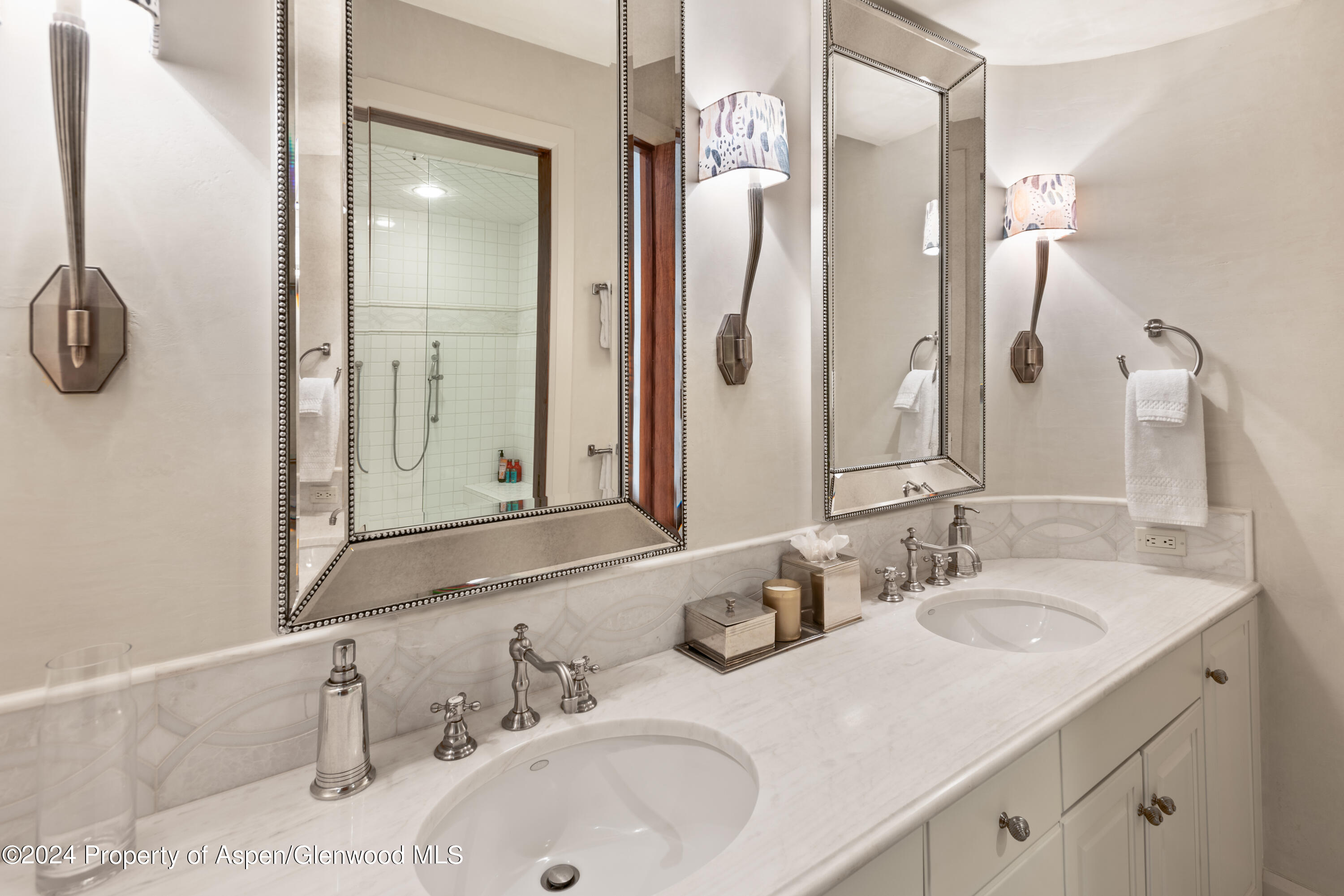 705 Spruce Street Aspen, CO 81611 - Photo 32 of 44 a bathroom with a sink and a mirror