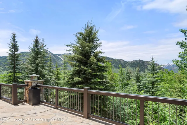 a balcony with an outdoor space