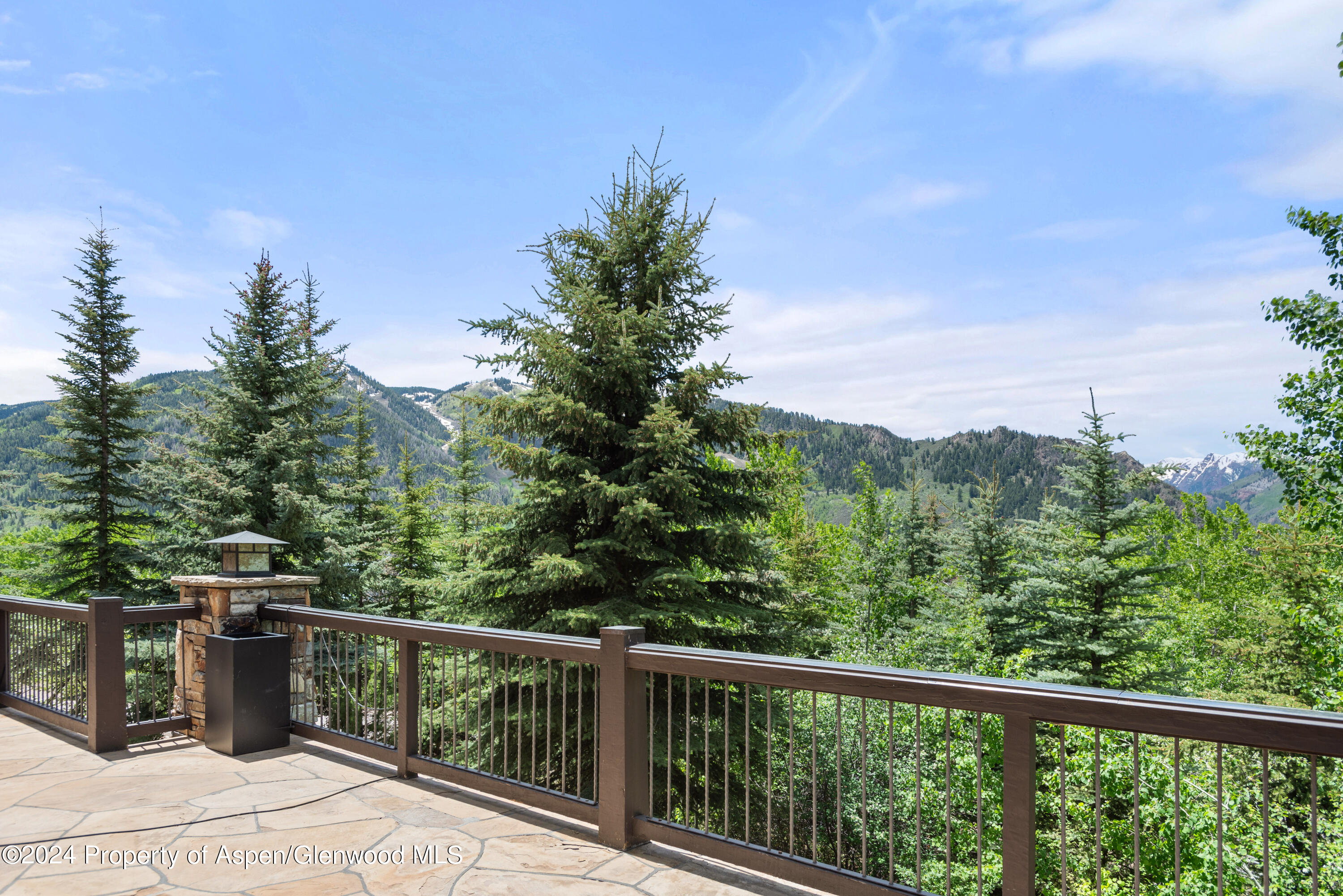 705 Spruce Street Aspen, CO 81611 - Photo 38 of 44 a balcony with an outdoor space