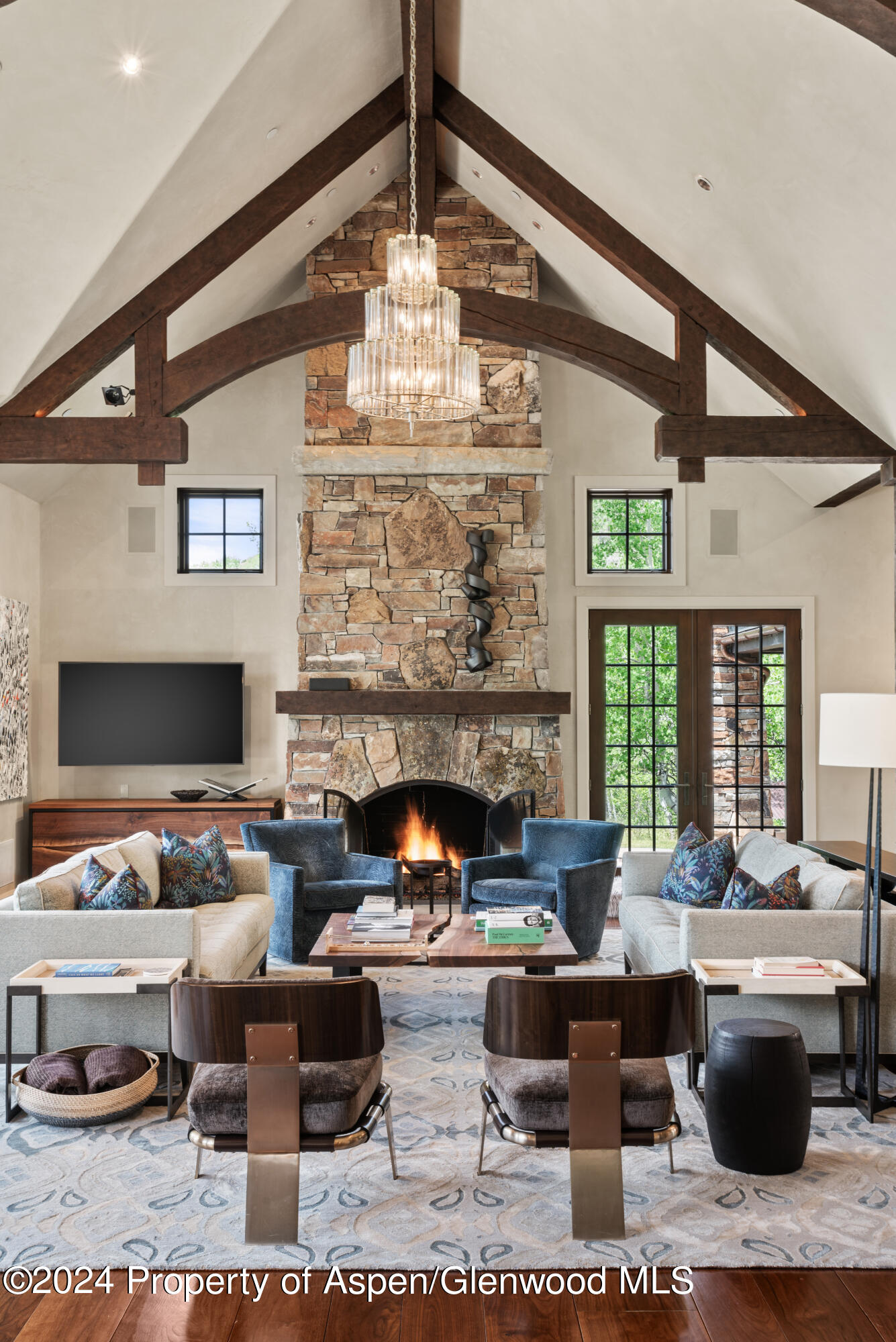 705 Spruce Street Aspen, CO 81611 - Photo 8 of 44 a living room with furniture and a fireplace