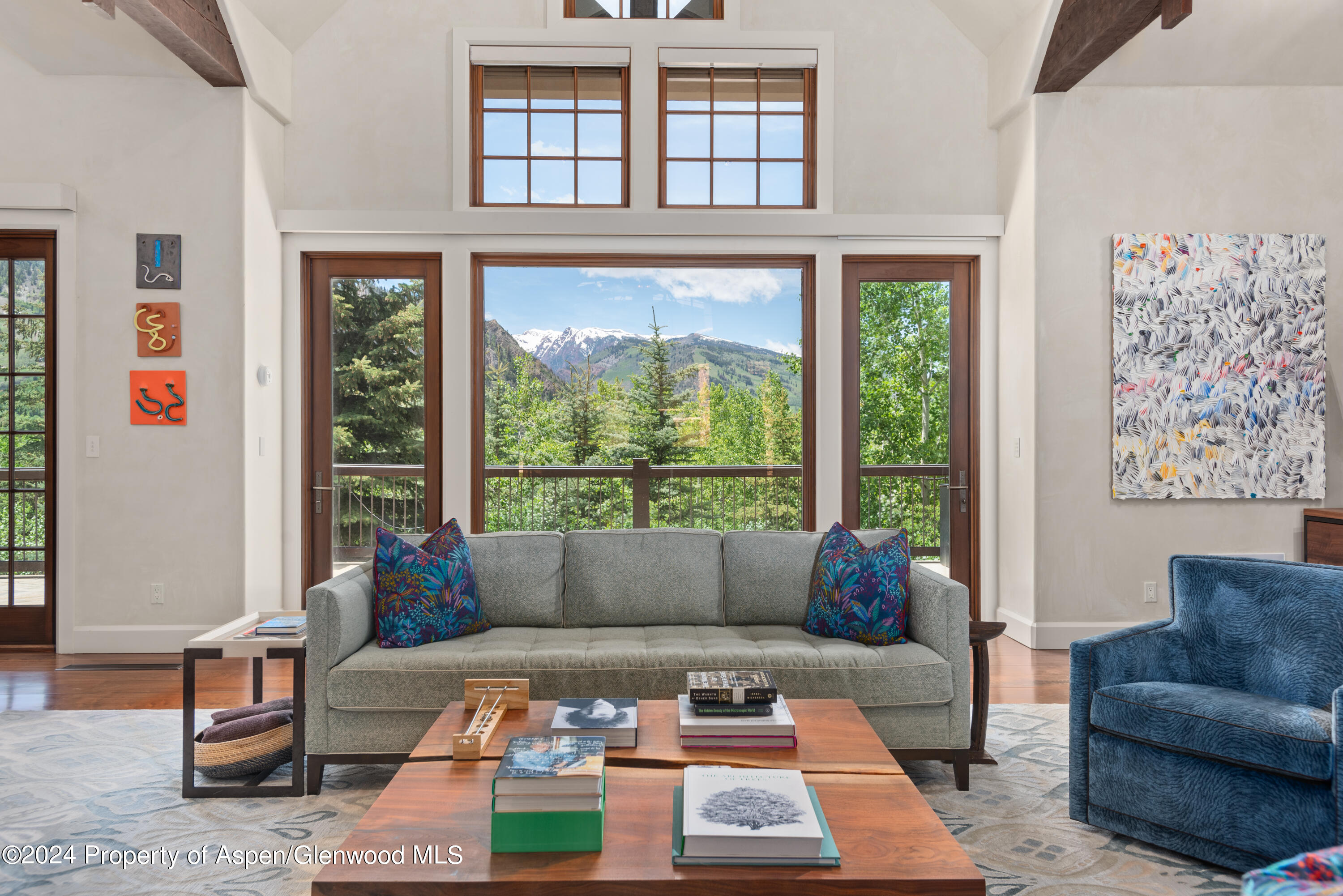 705 Spruce Street Aspen, CO 81611 - Photo 10 of 44 a living room with furniture and a large window