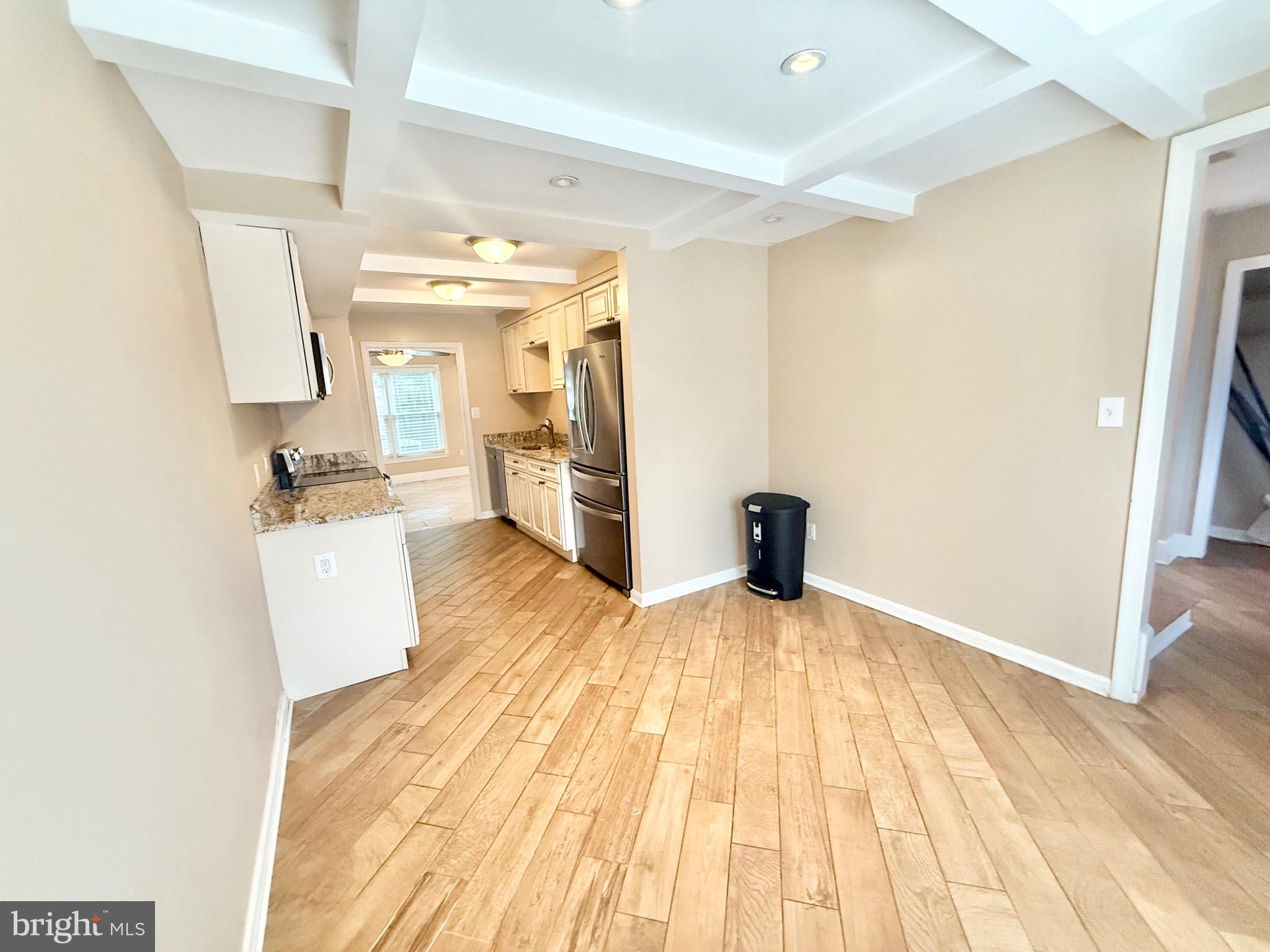 5439 Richenbacher Avenue Alexandria, VA 22304 - Photo 6 of 23 a view of a room with wooden floor and furniture