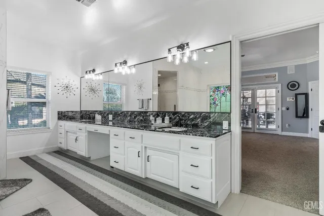 a kitchen with a sink stove and refrigerator