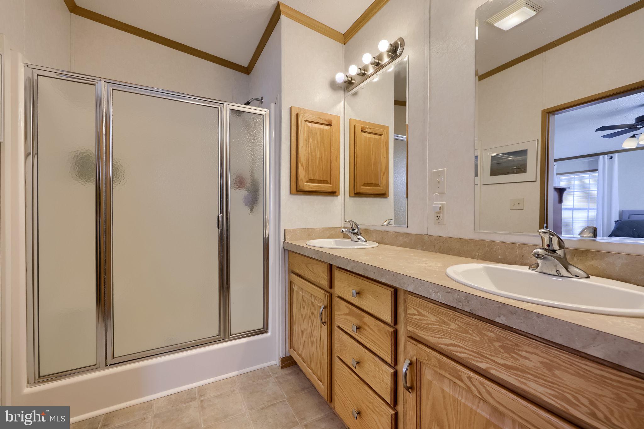 310 Summers Drive Lancaster, PA 17601 - Photo 20 of 44 a bathroom with a double vanity sink mirror and double