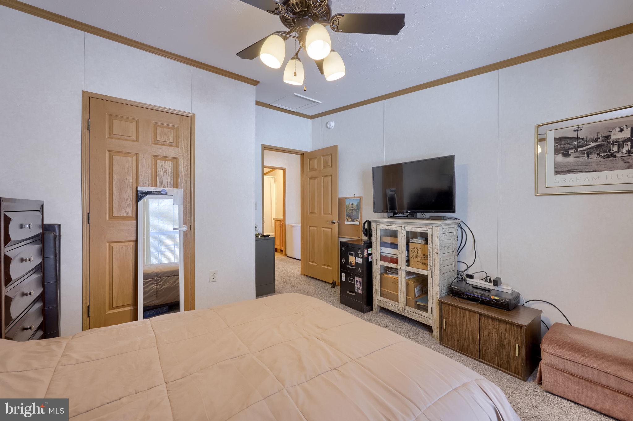 310 Summers Drive Lancaster, PA 17601 - Photo 23 of 44 a bedroom with a bed and a flat screen tv