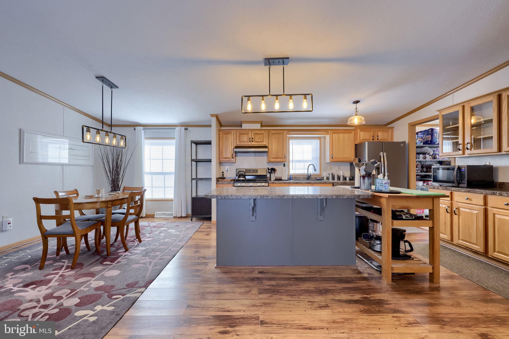 310 Summers Drive Lancaster, PA 17601 - Photo 6 of 44 a large kitchen with a table and chairs in it