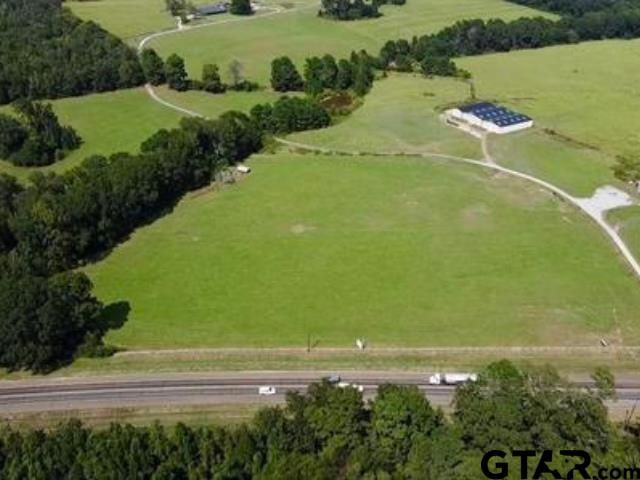 10864 State Highway 64 Overton, TX 75684 - Photo 2 of 5 a view of a tennis court