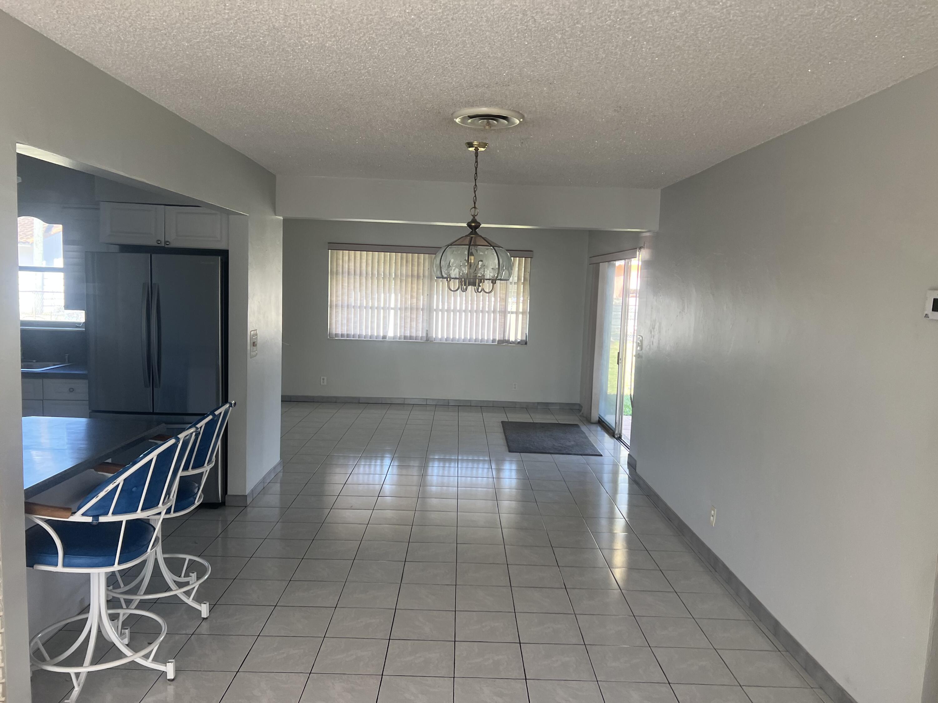 4007 Johnson Street Hollywood, FL 33021 - Photo 7 of 14 a view of entryway and hall with a bath tub