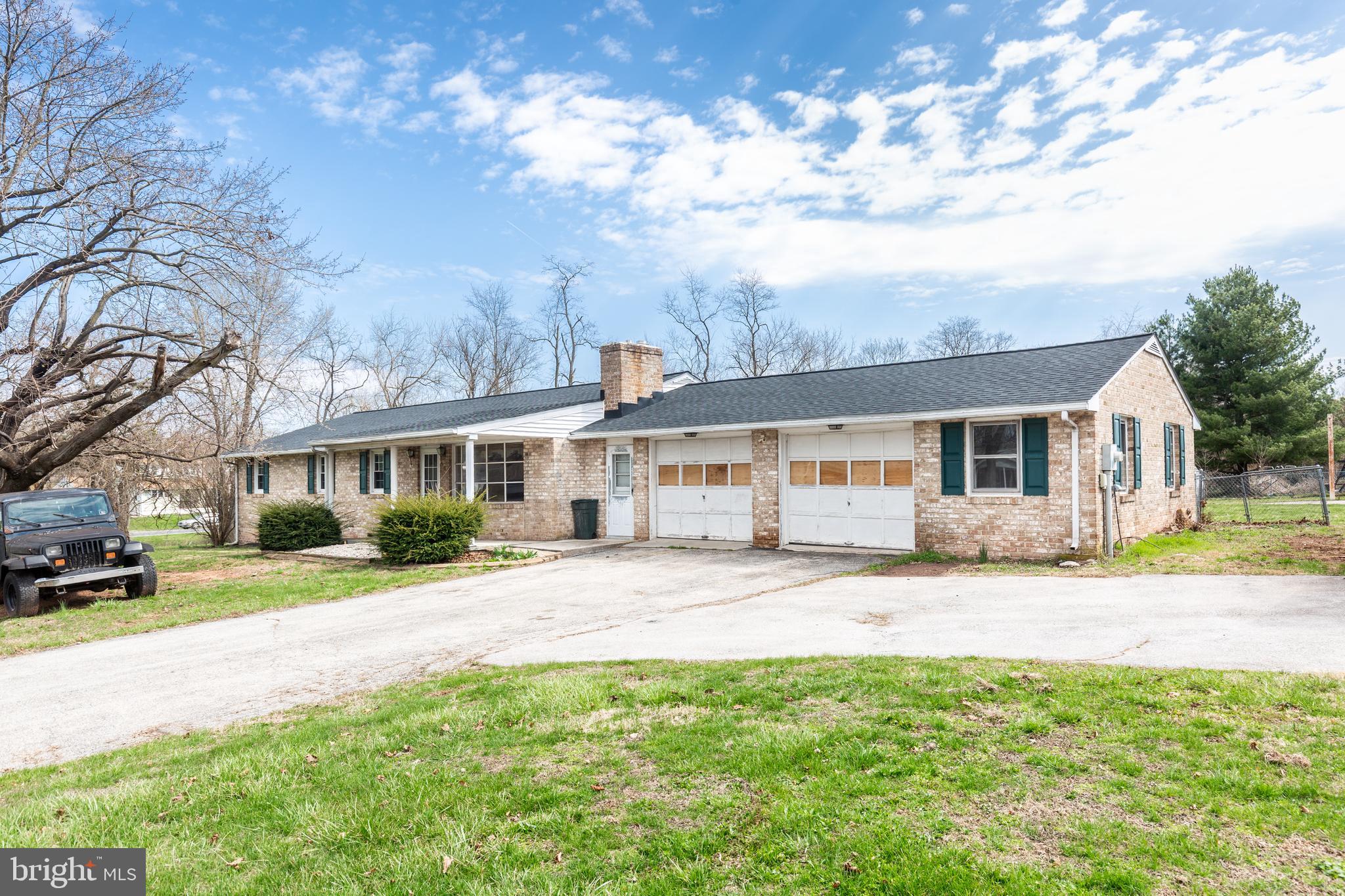 5 Sunset Drive Gettysburg, PA 17325 - Photo 1 of 56 a view of a house with a big yard and large trees