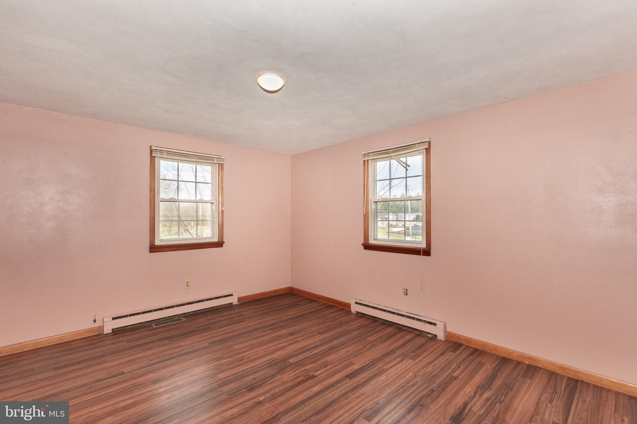 5 Sunset Drive Gettysburg, PA 17325 - Photo 15 of 56 an empty room with wooden floor and windows