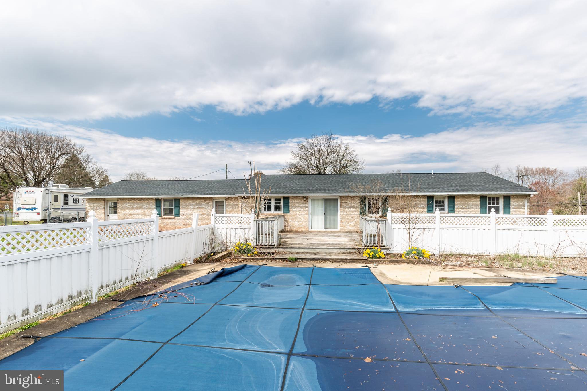 5 Sunset Drive Gettysburg, PA 17325 - Photo 17 of 56 a front view of a house with swimming pool and outdoor seating