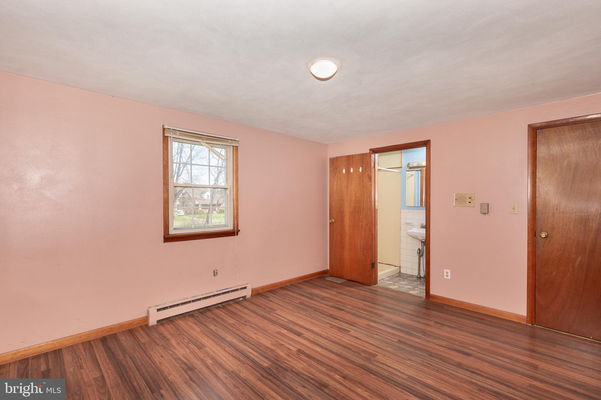 5 Sunset Drive Gettysburg, PA 17325 - Photo 46 of 56 an empty room with wooden floor and windows