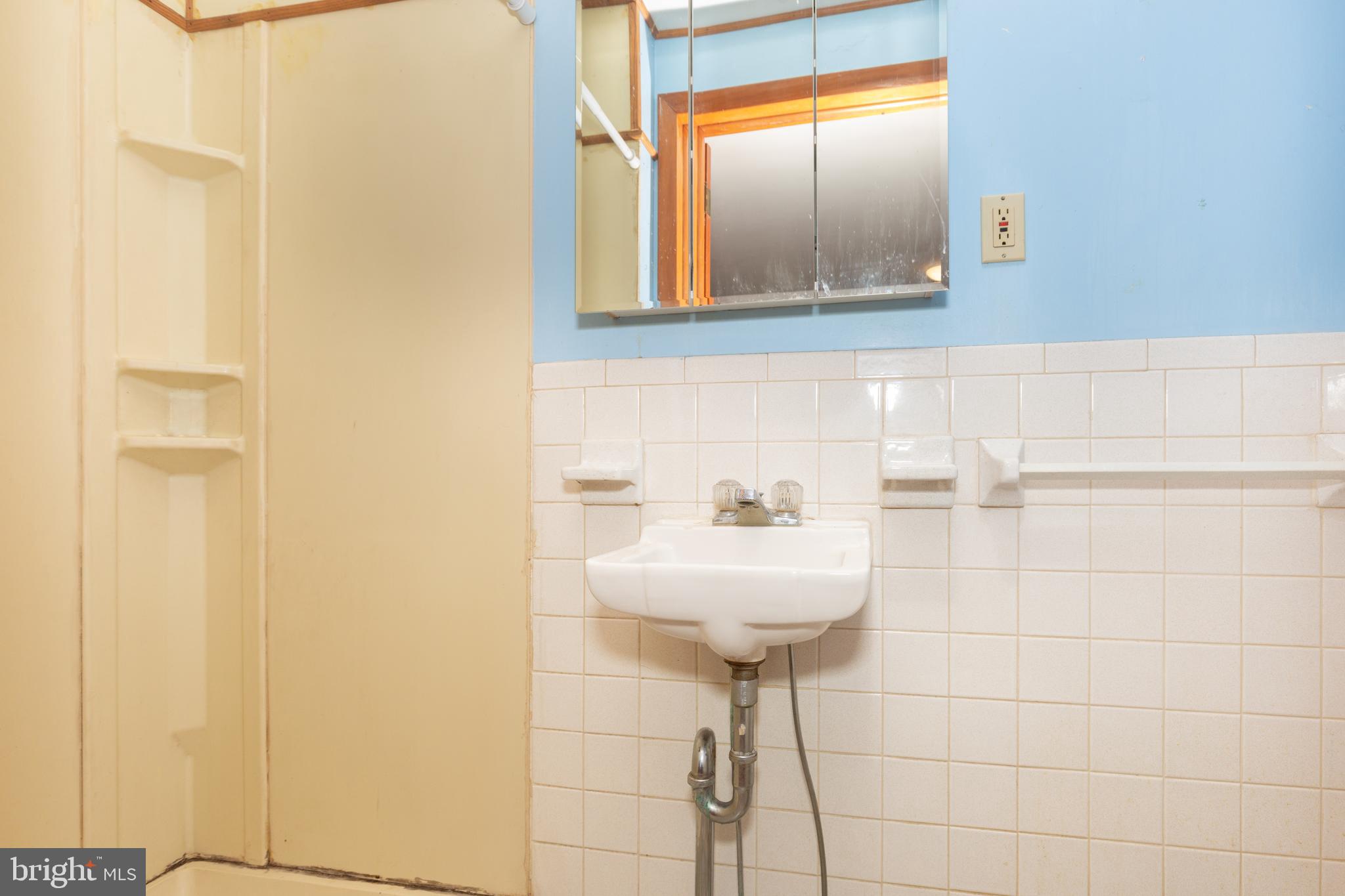 5 Sunset Drive Gettysburg, PA 17325 - Photo 48 of 56 a bathroom with a sink and mirror