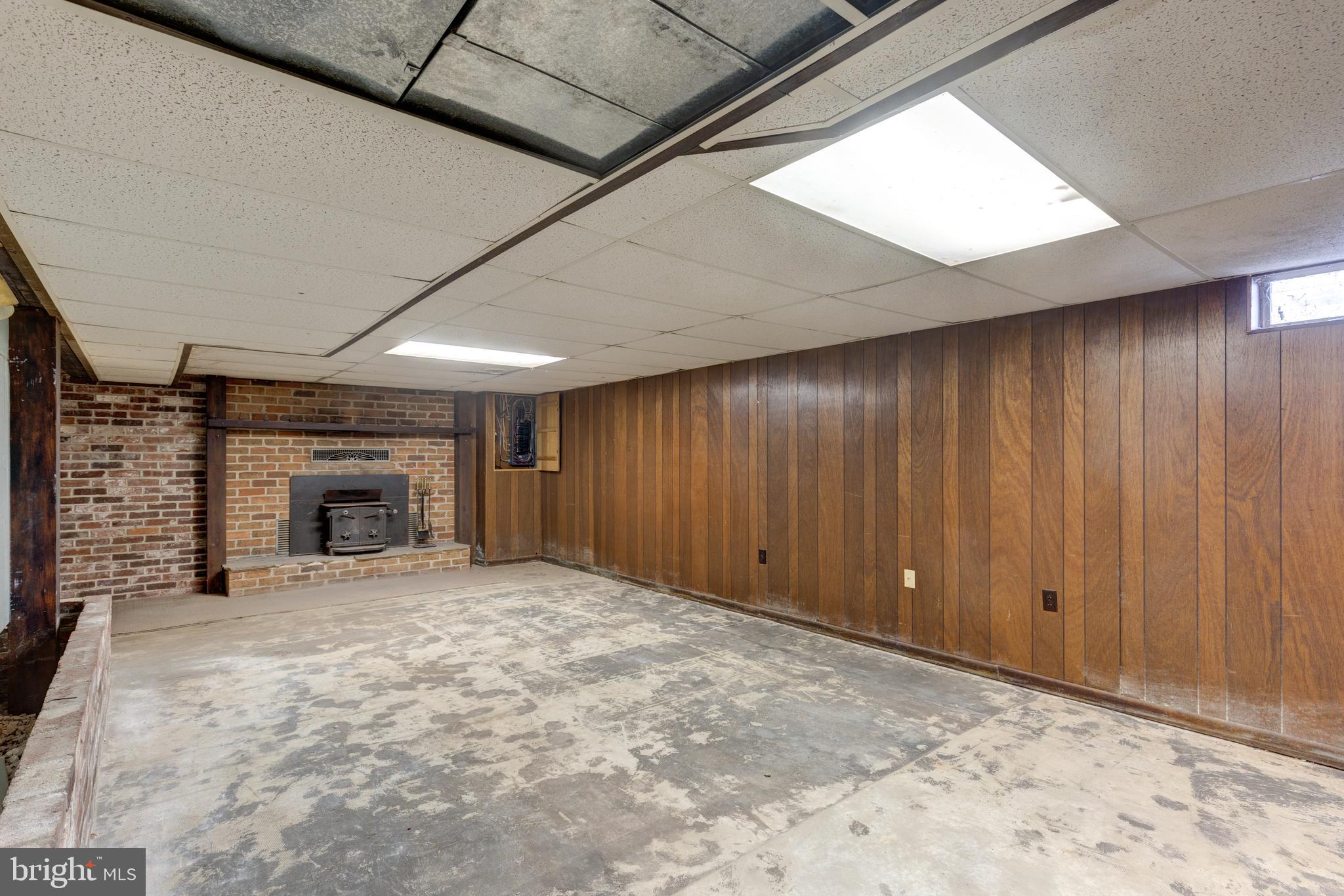 5 Sunset Drive Gettysburg, PA 17325 - Photo 52 of 56 a view of an empty room with a fireplace and a window