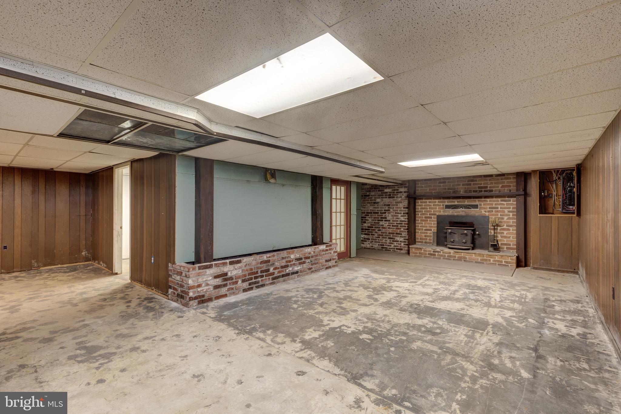 5 Sunset Drive Gettysburg, PA 17325 - Photo 53 of 56 a view of an empty room with a fireplace and a window