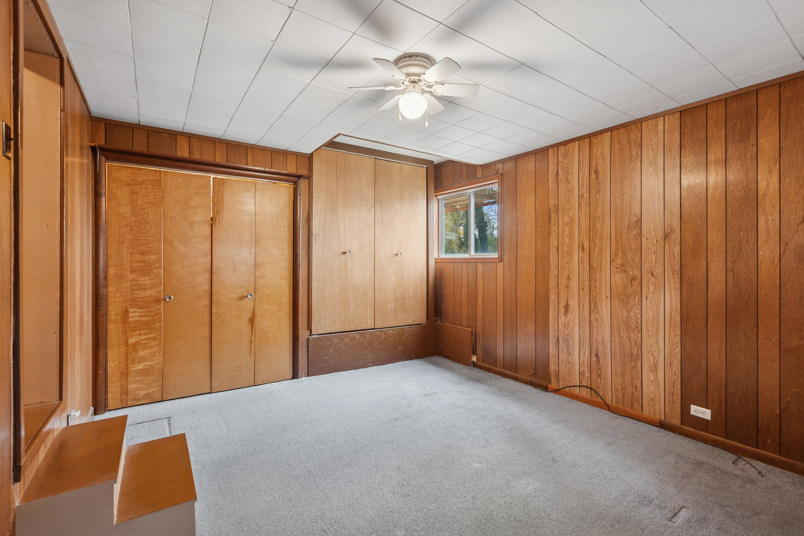 S348 East Street Winfield, IL 60190 - Photo 12 of 23 an empty room with windows and closet area