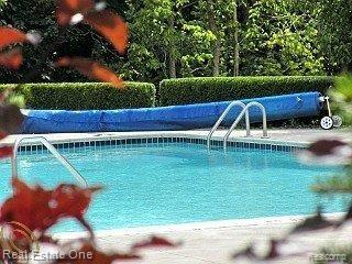 3521 Oakmonte Boulevard, Unit 74 Rochester, MI 48306 - Photo 24 of 31 Pool at Oakmonte