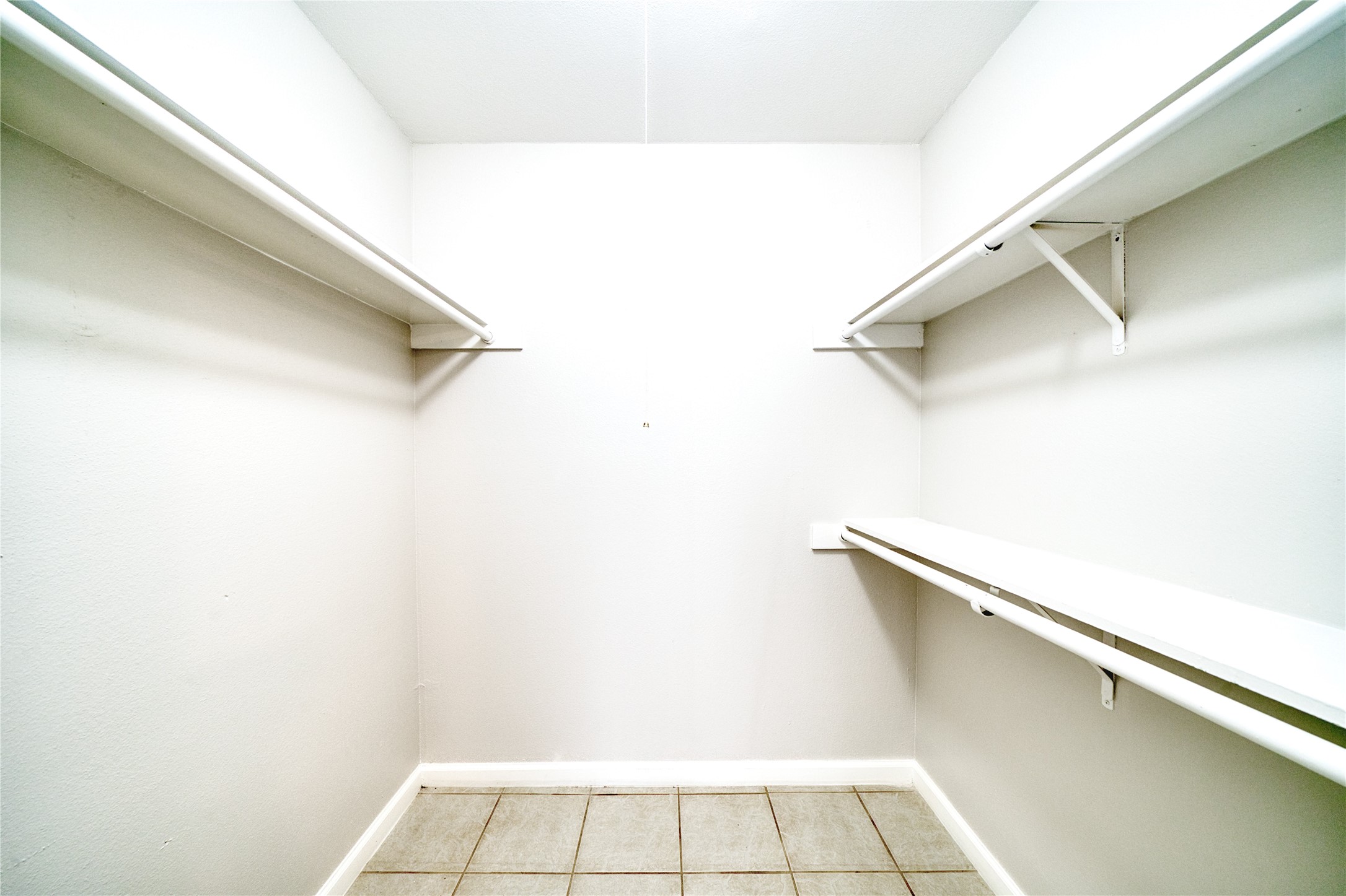 6001 Reims Road, Unit 209 Houston, TX 77036 - Photo 13 of 16 a view of a room with white walls