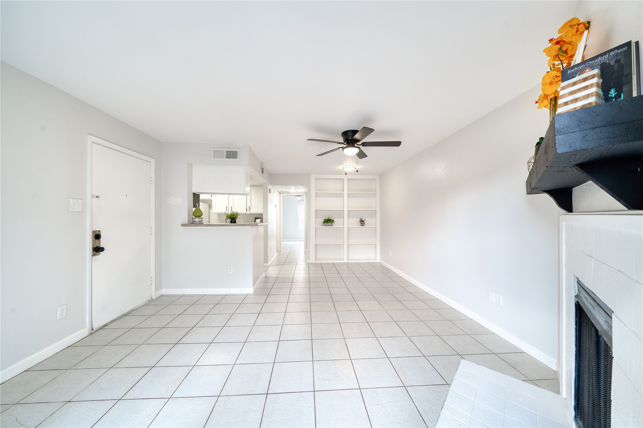 6001 Reims Road, Unit 209 Houston, TX 77036 - Photo 4 of 16 a view of an empty room and window