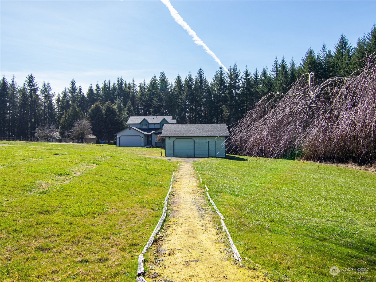 136 Hewitt Road Chehalis, WA 98532 - Photo 32 of 38 a view of a swimming pool with a yard and trees
