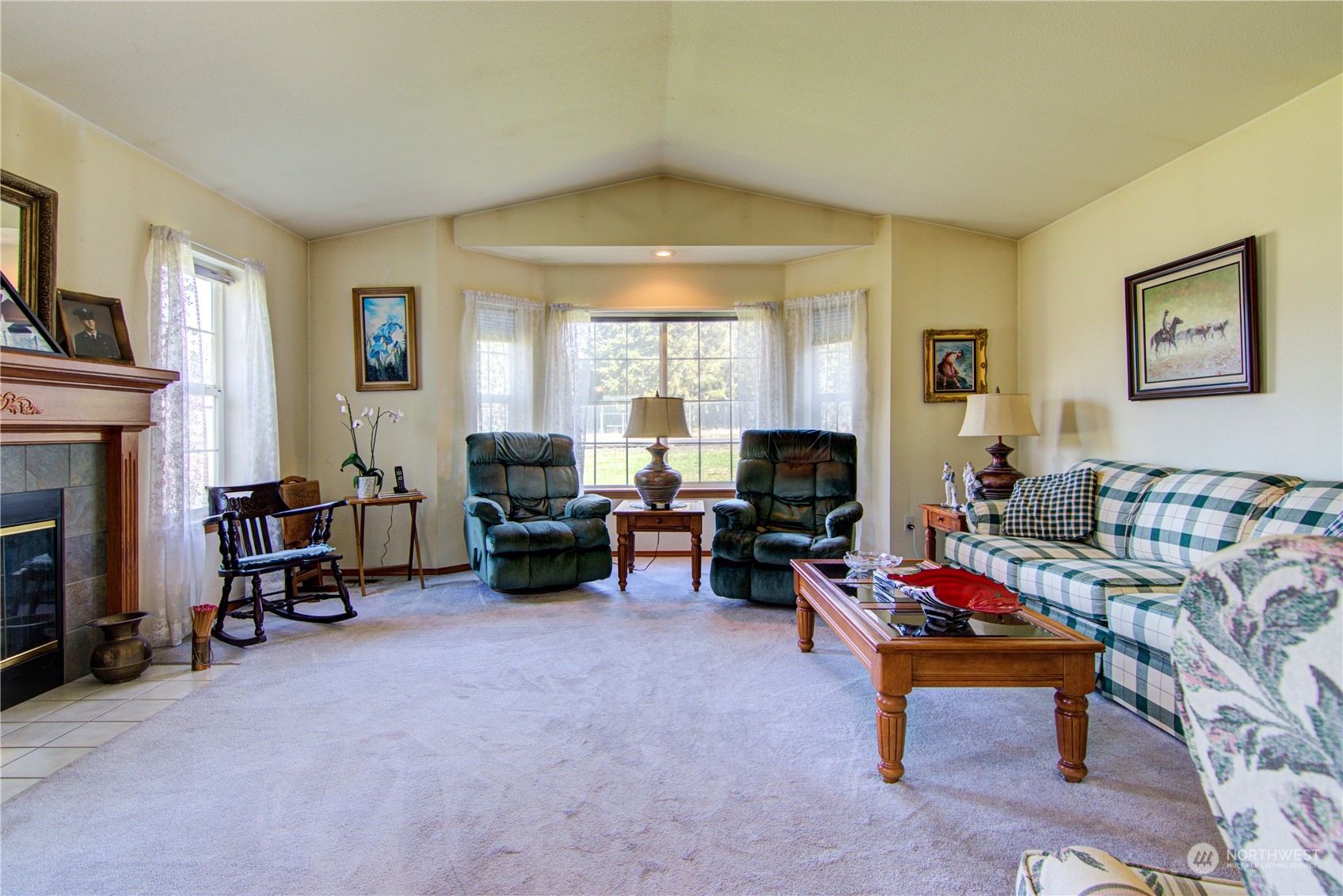 136 Hewitt Road Chehalis, WA 98532 - Photo 7 of 38 a living room with furniture and a fireplace