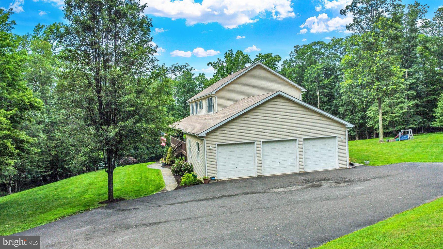 3700 Lehnenberg Road Riegelsville, PA 18077 - Photo 11 of 48 a view of a house with a yard and large tree