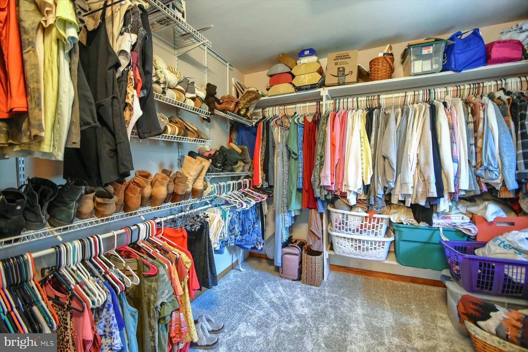 3700 Lehnenberg Road Riegelsville, PA 18077 - Photo 17 of 48 a view of walk in closet with clothes and shoes