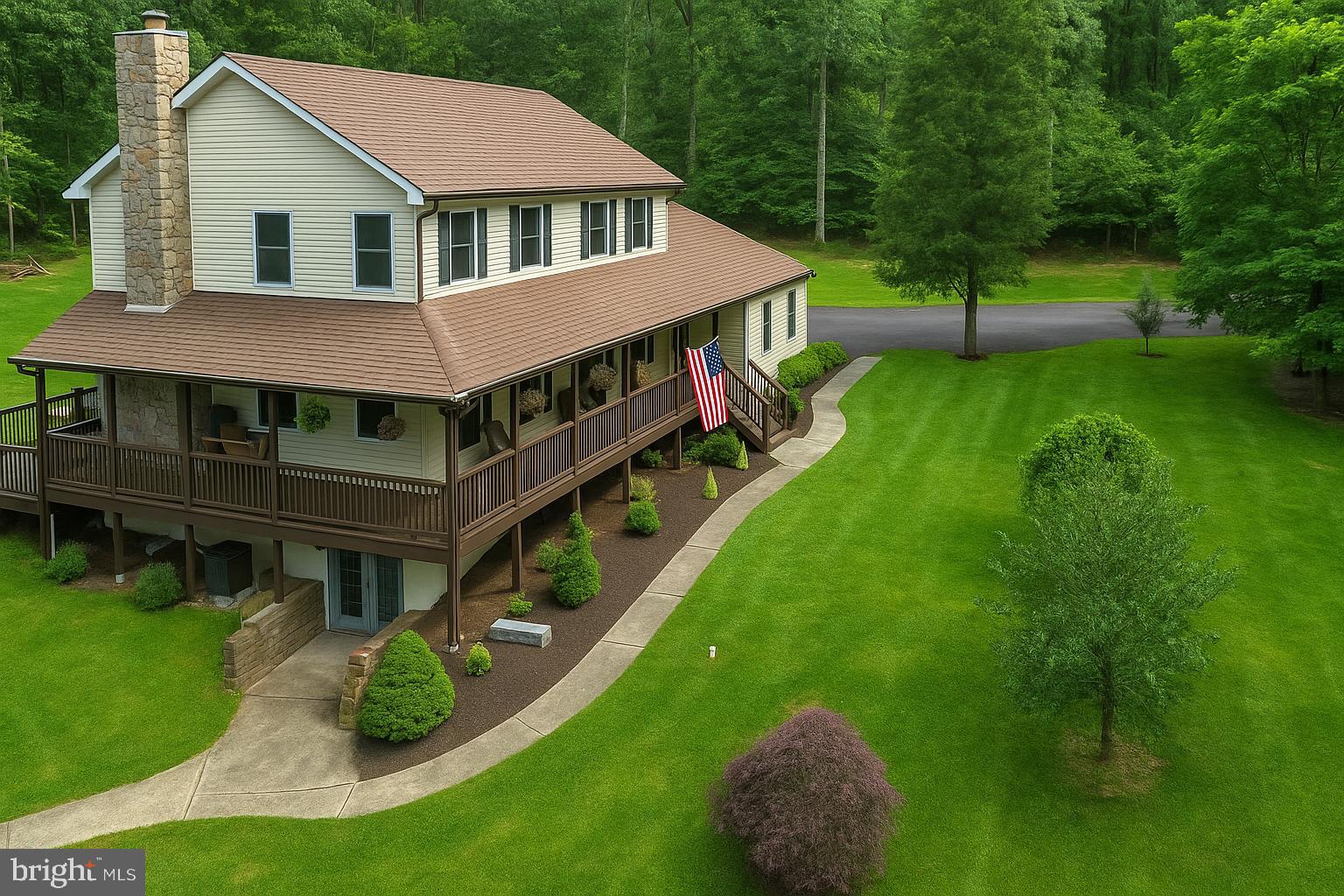 3700 Lehnenberg Road Riegelsville, PA 18077 - Photo 2 of 48 a aerial view of a house with a yard table and chairs