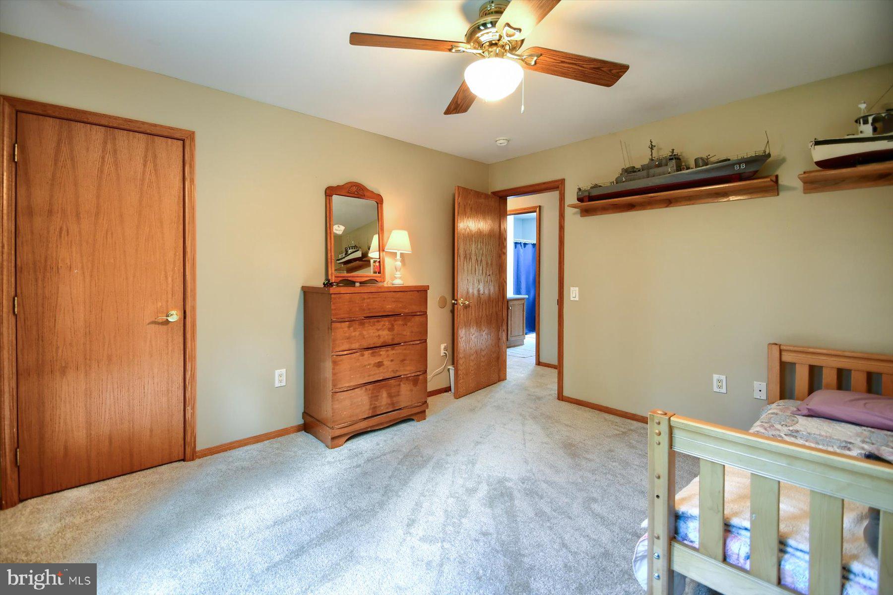3700 Lehnenberg Road Riegelsville, PA 18077 - Photo 23 of 48 a view of a bedroom with closet and cabinet