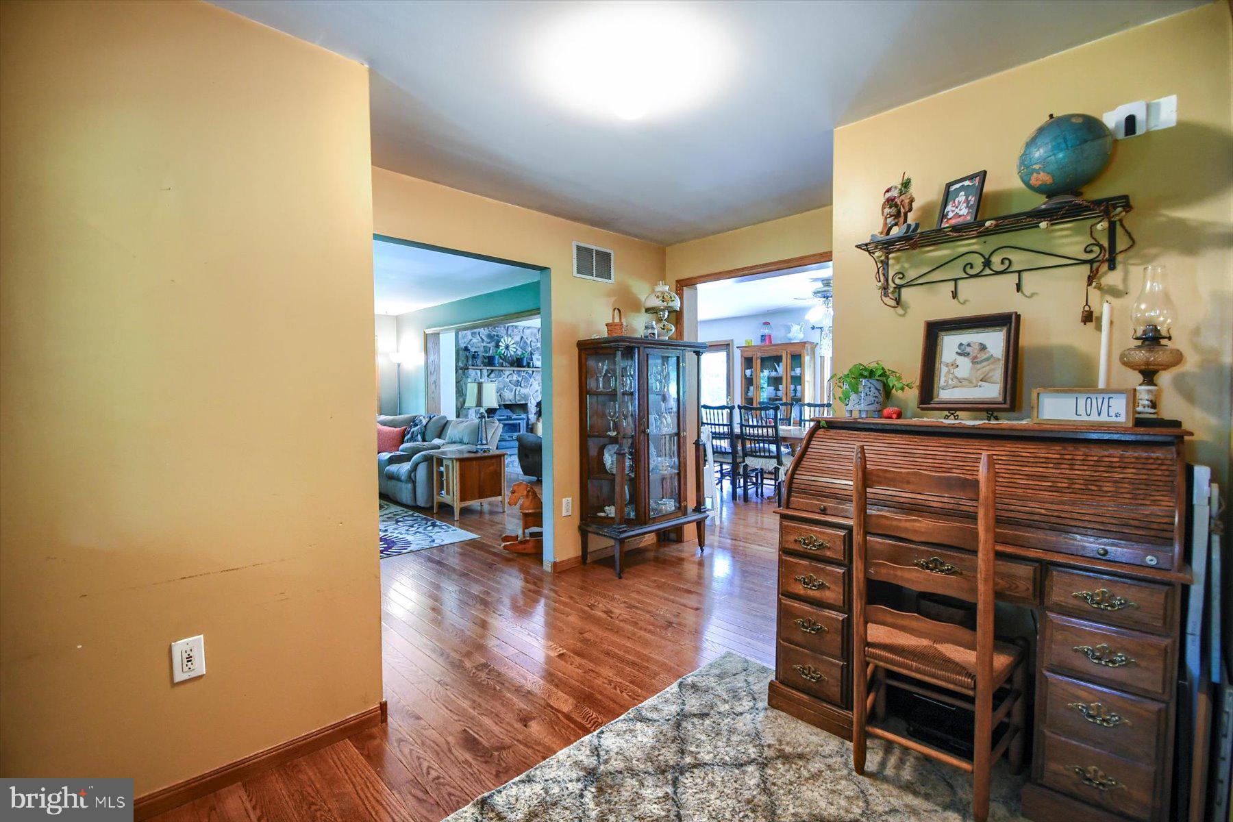 3700 Lehnenberg Road Riegelsville, PA 18077 - Photo 24 of 48 a living room with furniture and a wooden floor