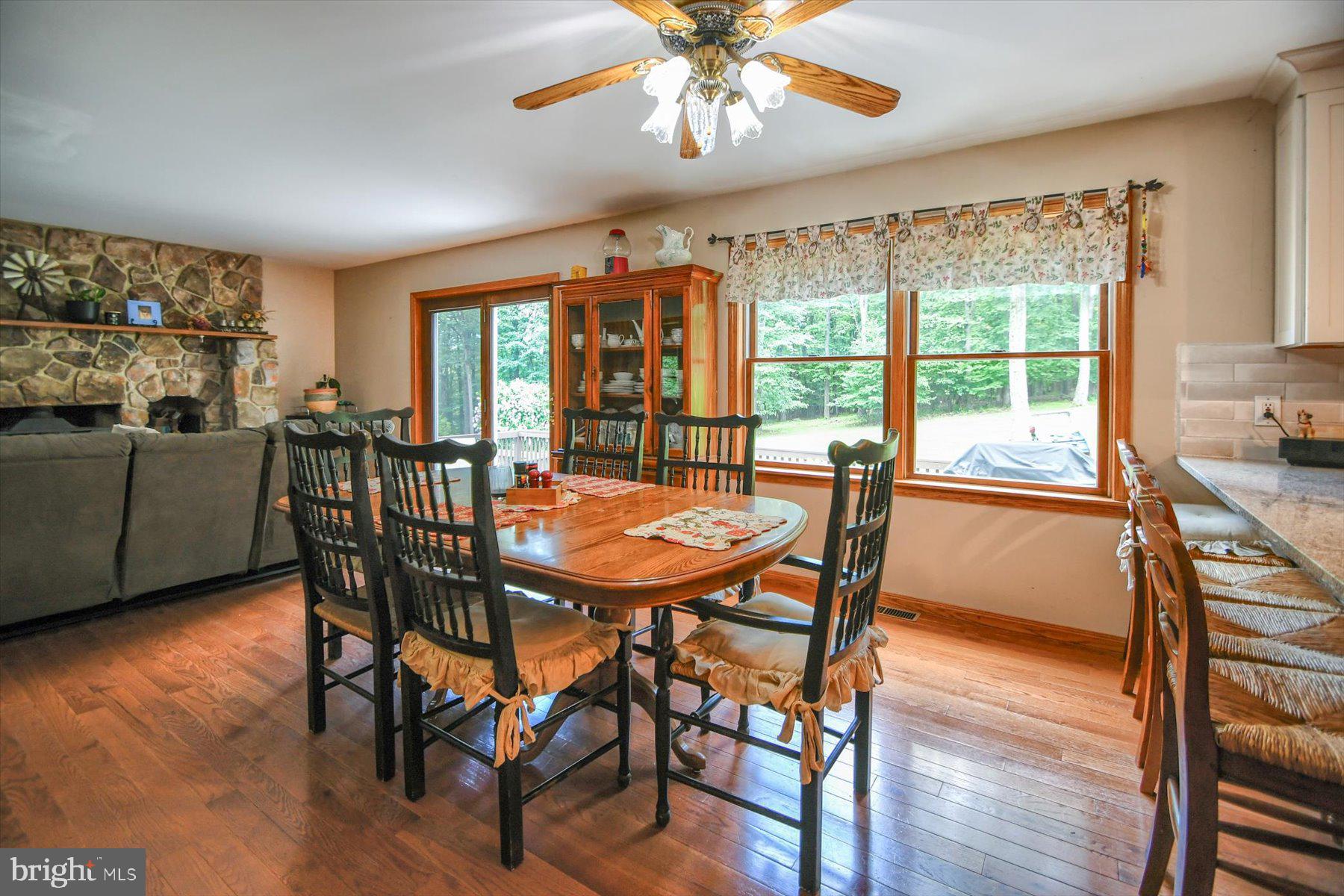 3700 Lehnenberg Road Riegelsville, PA 18077 - Photo 31 of 48 a view of a dining room with furniture window and wooden floor