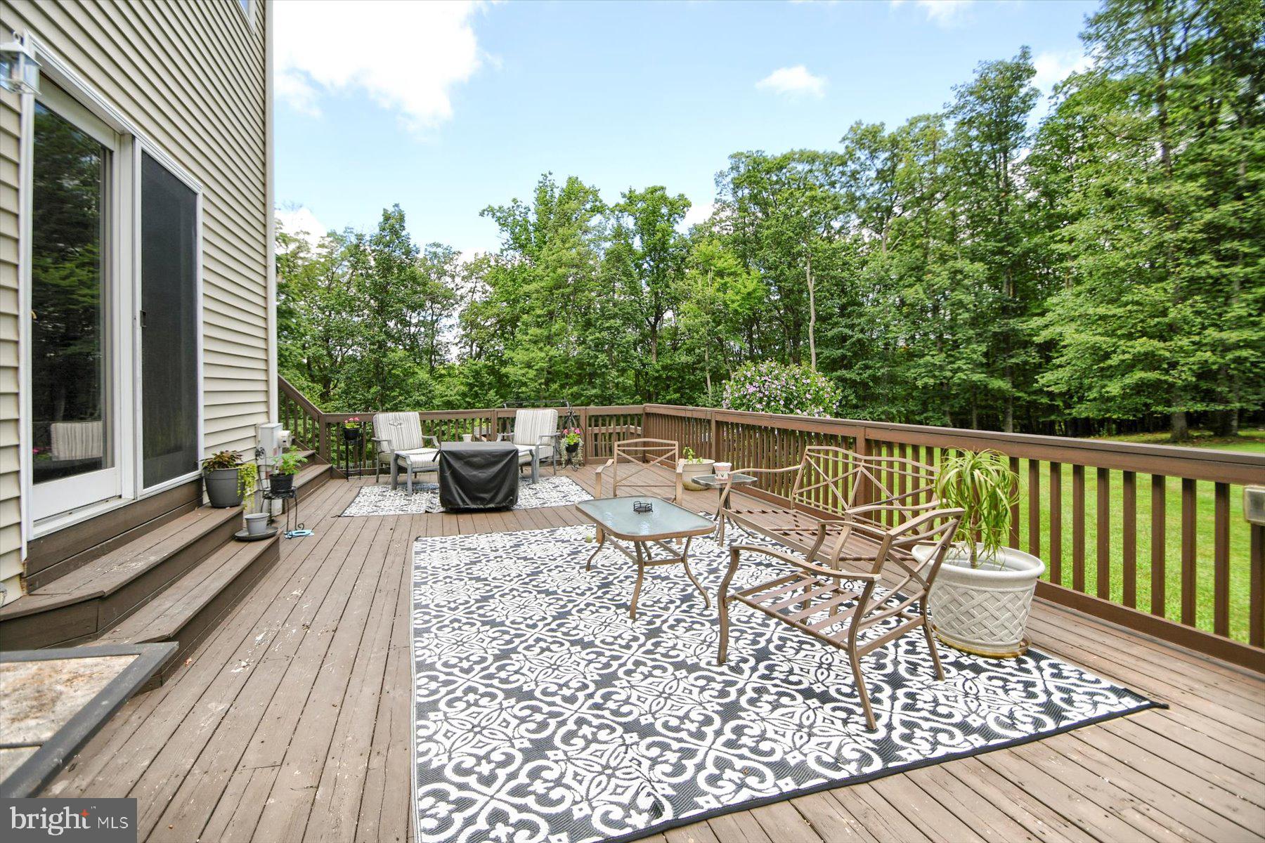 3700 Lehnenberg Road Riegelsville, PA 18077 - Photo 32 of 48 a view of a chairs and table on the wooden floor