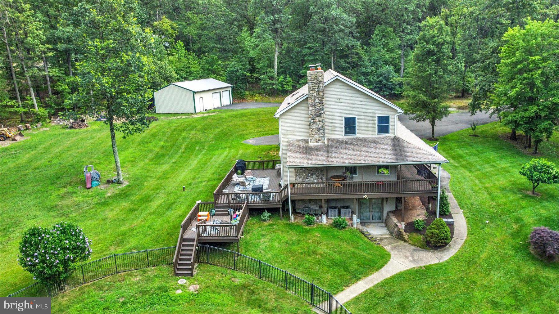 3700 Lehnenberg Road Riegelsville, PA 18077 - Photo 7 of 48 a aerial view of a house with backyard and garden