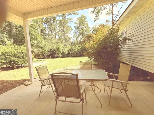 a view of an outdoor space with seating area