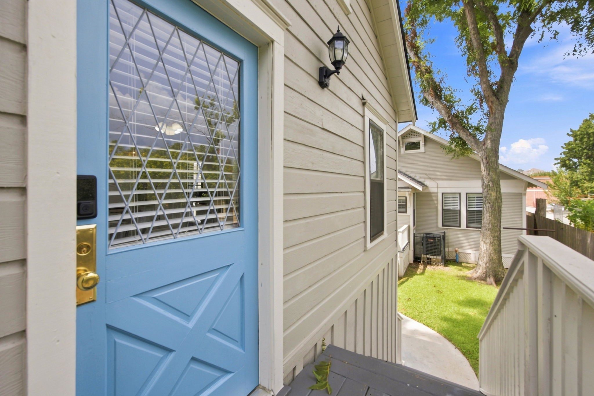 4618 McEwen Street Houston, TX 77009 - Photo 23 of 39 Check out the charm of the reclaimed door that welcomes you to the garage apartment.