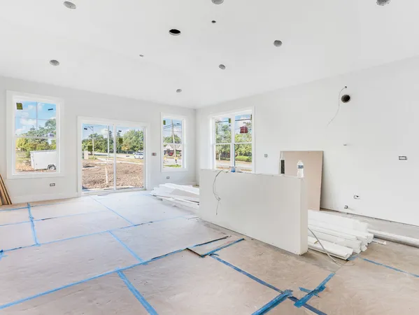 a living room with furniture and window