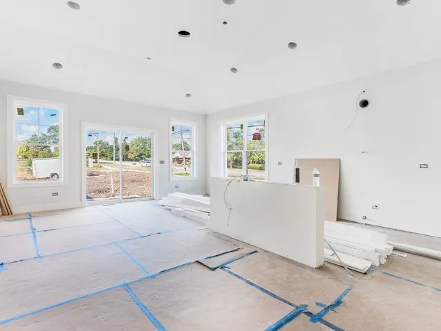 a living room with furniture and window