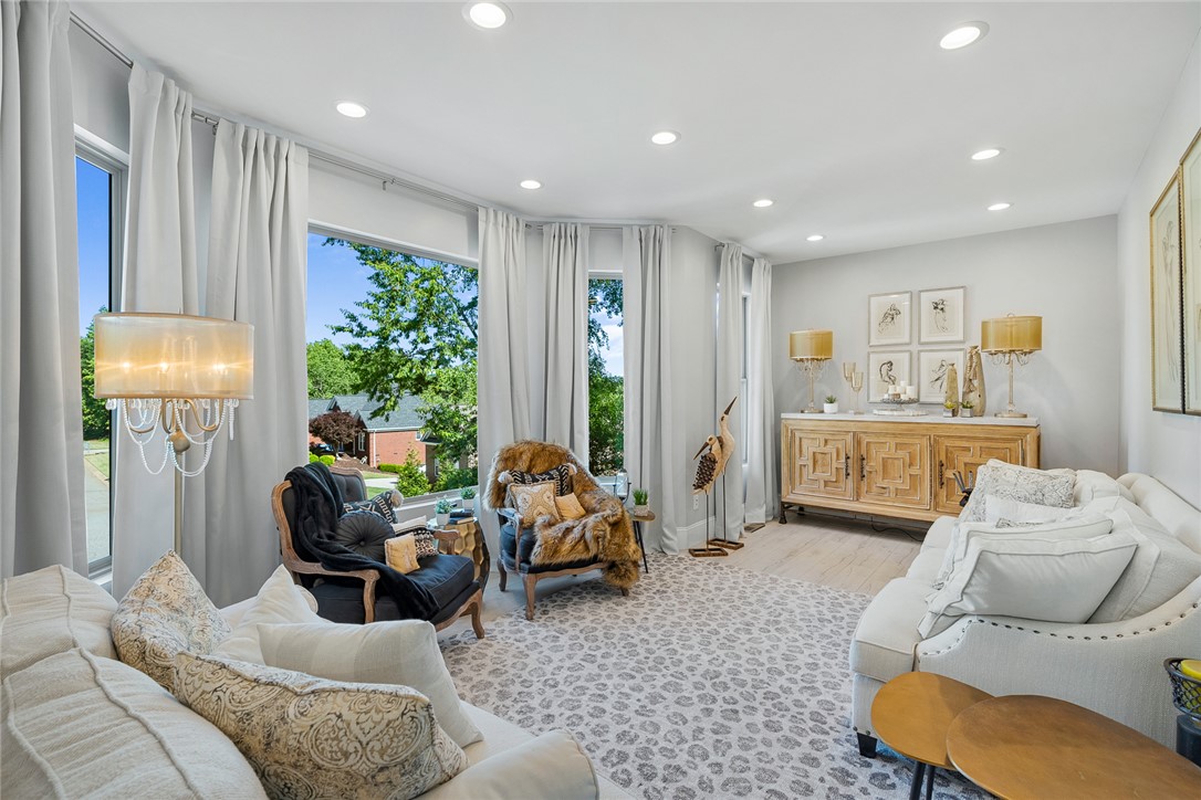 140 Turnberry Road Anderson, SC 29621 - Photo 6 of 44 This bright living space features expansive windows and ample recessed lighting, perfect for everyday living.