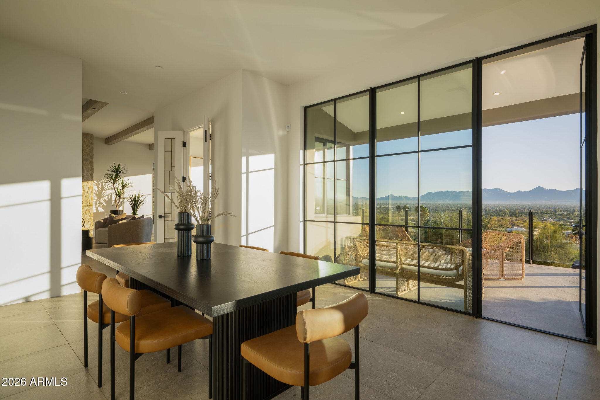 5939 East Quartz Mountain Road Paradise Valley, AZ 85253 - Photo 13 of 39 a dining room with furniture and a floor to ceiling window