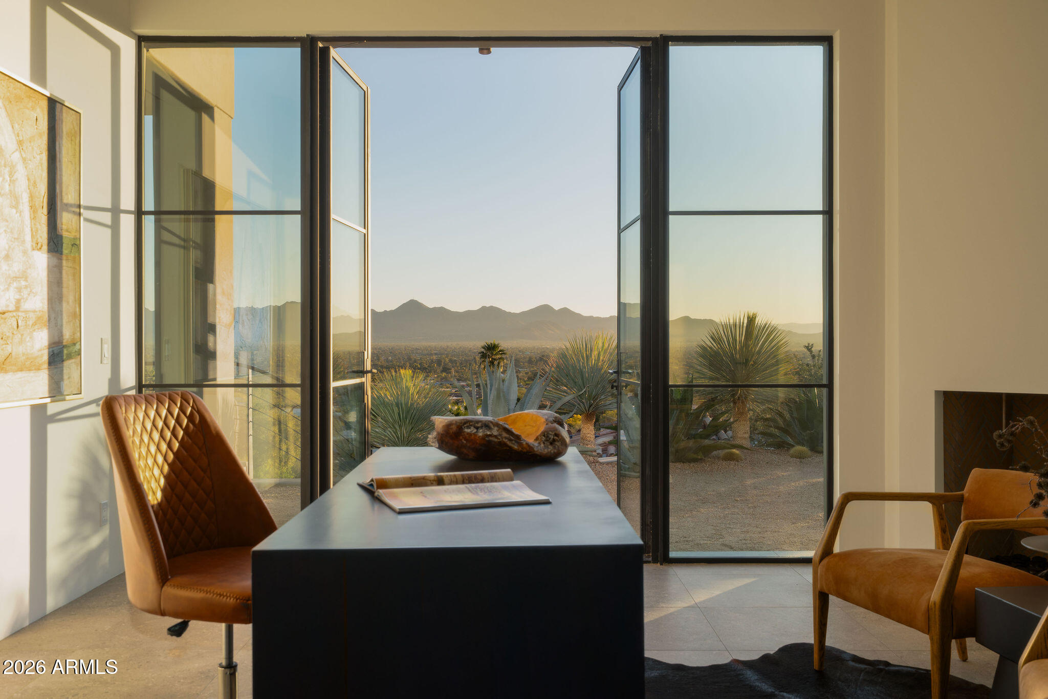 5939 East Quartz Mountain Road Paradise Valley, AZ 85253 - Photo 16 of 39 a view of a balcony with chair and a potted plant