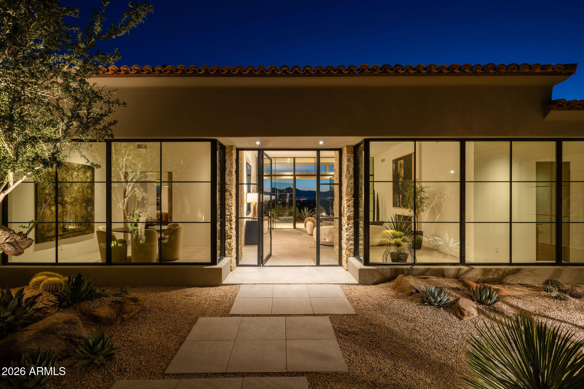 5939 East Quartz Mountain Road Paradise Valley, AZ 85253 - Photo 31 of 39 a view of a house with a patio