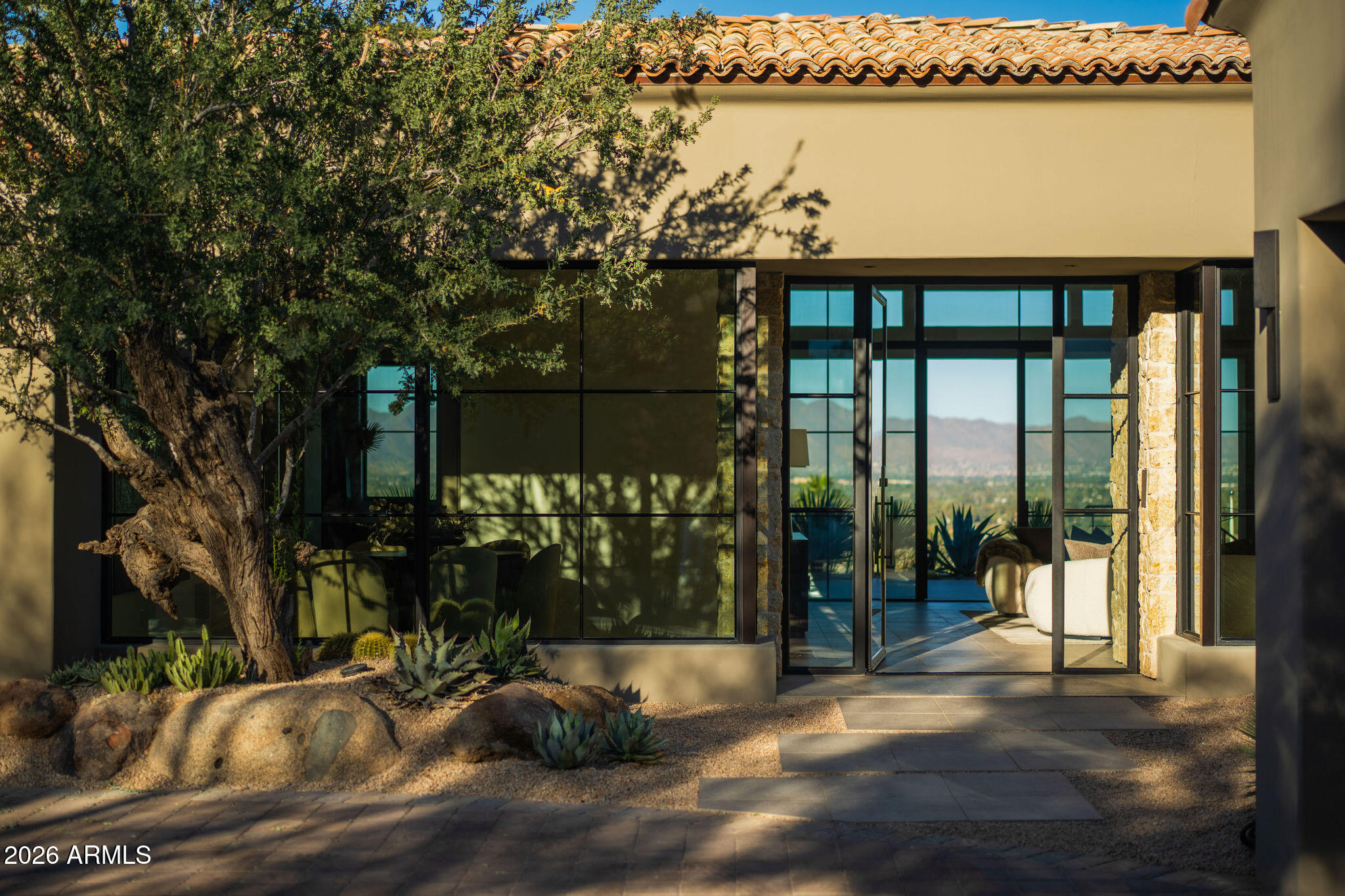 5939 East Quartz Mountain Road Paradise Valley, AZ 85253 - Photo 6 of 39 a front view of a house with a yard
