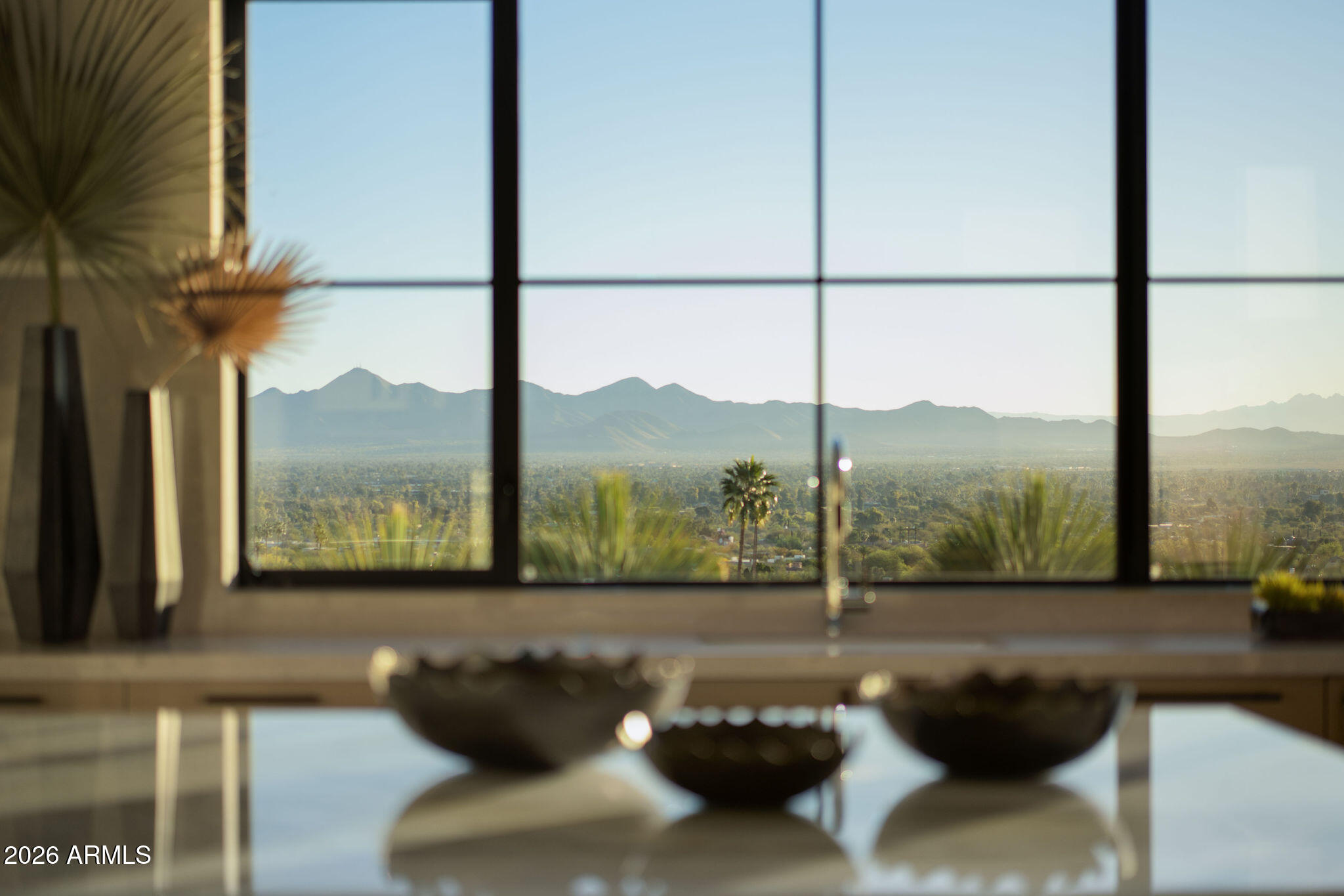 5939 East Quartz Mountain Road Paradise Valley, AZ 85253 - Photo 10 of 39 a view of a floor to ceiling window with an outdoor living room