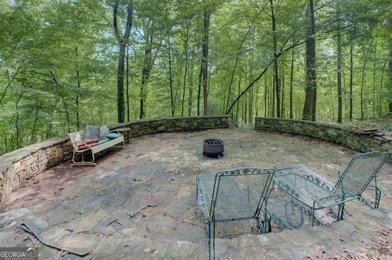 119 Shoals Point Eatonton, GA 31024 - Photo 88 of 110 a view of outdoor space with deck and yard