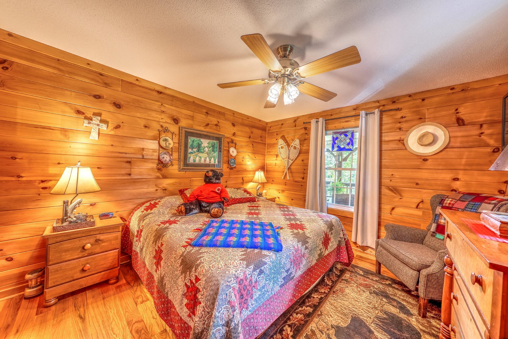 260 Deer Ridge Trail Ocoee, TN 37361 - Photo 56 of 72 a bedroom with a bed and wooden floor