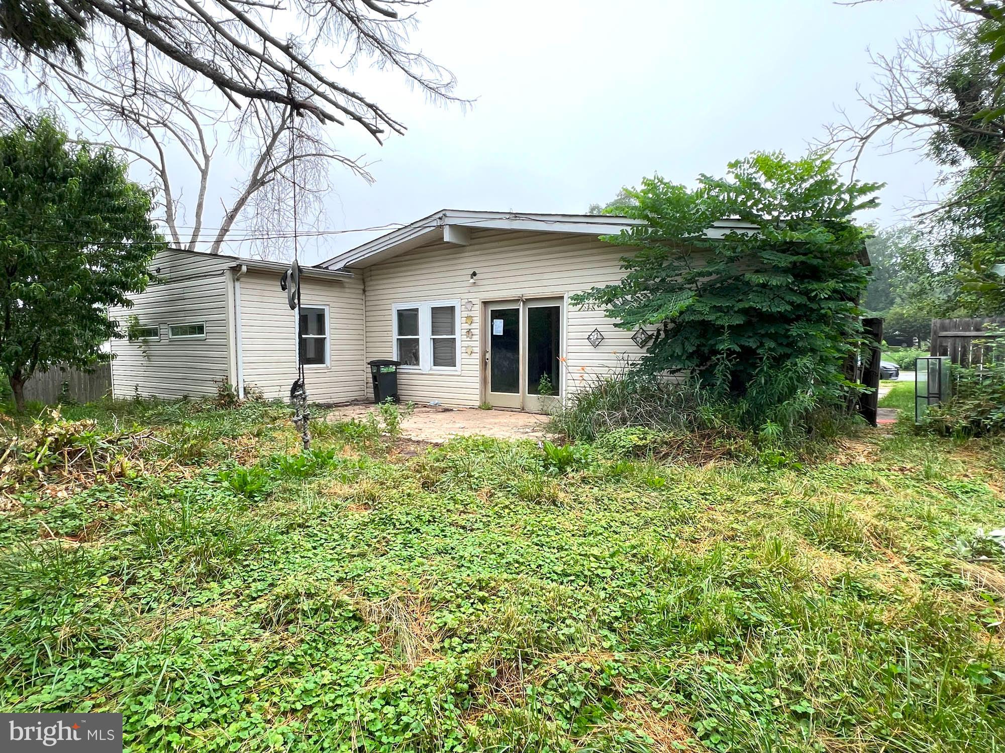 4761 Bonnie Brae Road Pikesville, MD 21208 - Photo 2 of 15 a front view of a house with a yard