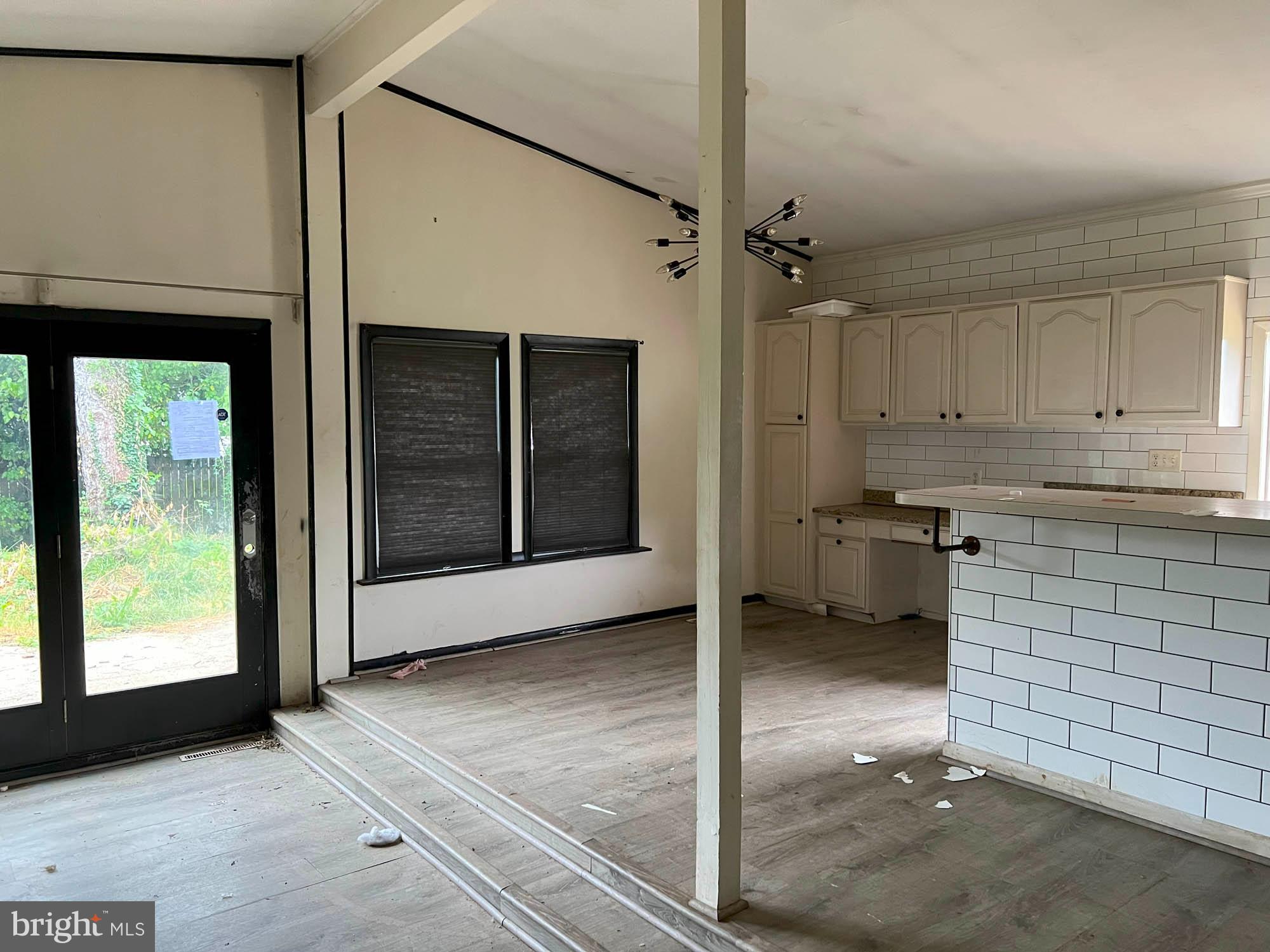 4761 Bonnie Brae Road Pikesville, MD 21208 - Photo 4 of 15 a view of a kitchen with a sink and a window