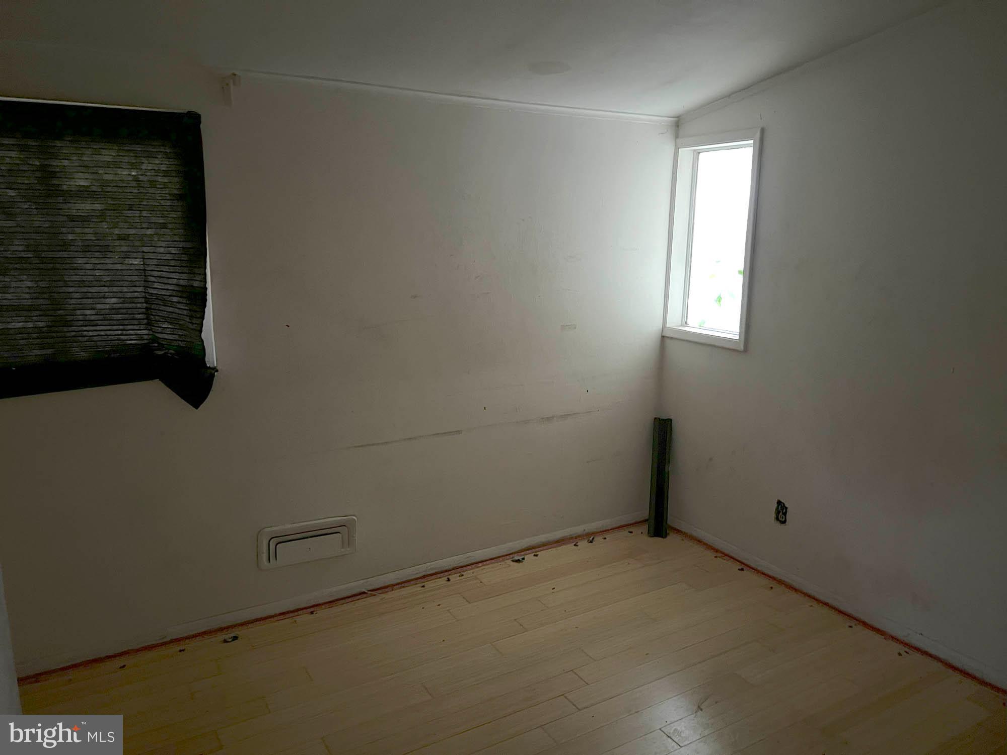 4761 Bonnie Brae Road Pikesville, MD 21208 - Photo 7 of 15 an empty room with a window