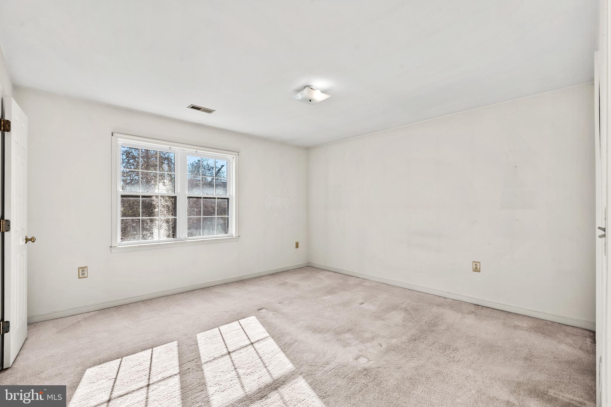 18159 Miss Clara Lane Ruther Glen, VA 22546 - Photo 16 of 31 a view of an empty room with a window