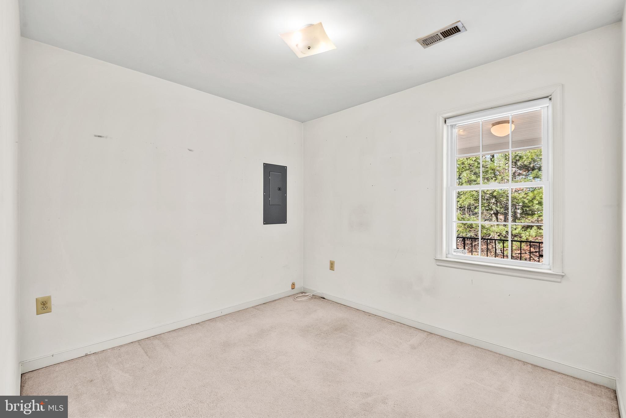 18159 Miss Clara Lane Ruther Glen, VA 22546 - Photo 18 of 31 an empty room with a window